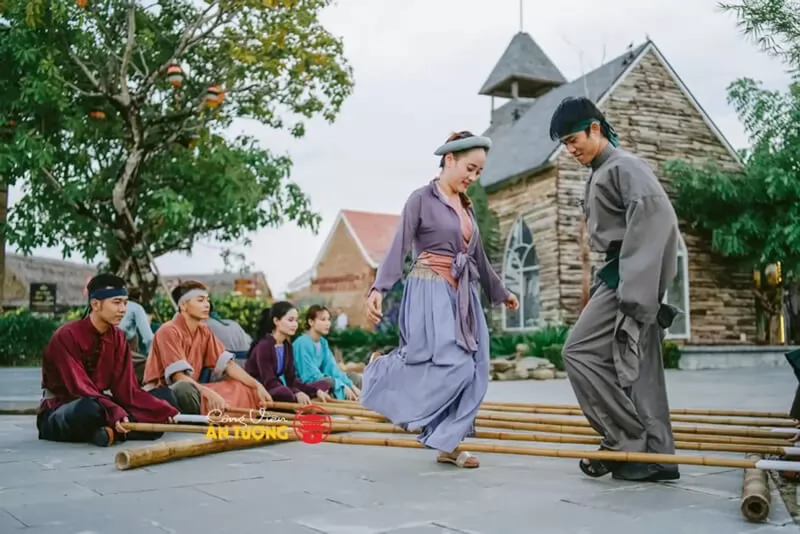 Participate in folk games at Hoi An Impression Park